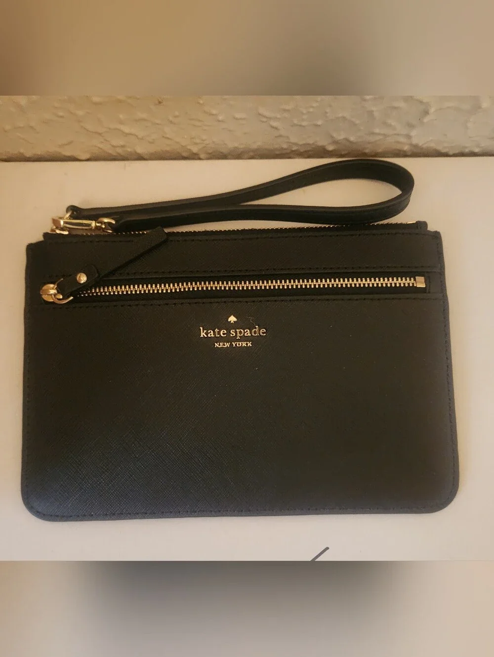 kate spade black leather wristlet with gold hardware